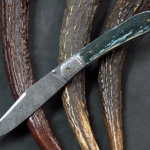 Don Hanson III Blue Mammoth Folder reverse